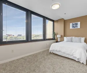 Photo 4 - Sleek 2BR Downtown Retreat with Gym