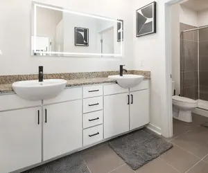 Photo 2 - Uptown 1st Ward Corner Unit Superior 2BD Apt