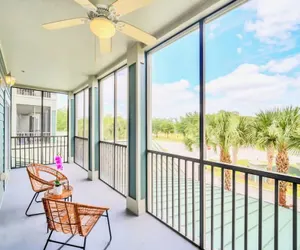 Photo 2 - Tropical Styled Condo w Outdoor Pool and Hot Tub