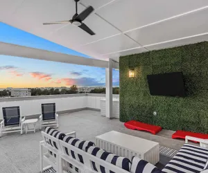 Photo 2 - Rooftop Deck w/ Ocean View, Pool, Walk to Beach! Coastal Canopy by Avantstay