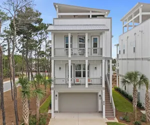 Photo 5 - Rooftop Deck w/ Ocean View, Pool, Walk to Beach! Coastal Canopy by Avantstay