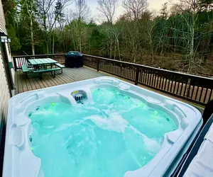 Photo 2 - Family Fun Oasis Hot Tub Steam Room Pool Stream Firepit Games