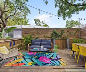 Photo 2 - Deck Lounge w/ Hot Tub, Fire Pit, & Garage Game Room Hidden Grove by Avantstay
