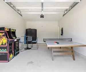 Photo 3 - Playfully Designed Home + Hot Tub, Fire Pit & Game Room Blue Hour by Avantstay