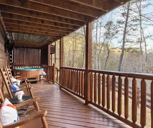 Photo 5 - Redesigned, Hot Tub, Firepit, Billiards Pigeon Forge Riverbend by Avantstay