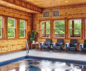 Photo 2 - Smoky Ridge by Avantstay Renovated Cabin w/ Indoor Pool Game Room + Theater