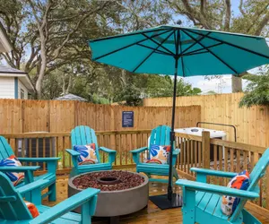 Photo 2 - Blue Hour Playfully Designed Beach Home w Hot Tub Fire Pit Game Room
