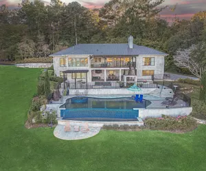Photo 2 - 7BR Lakefront Haven Pool Hot Tub Gated 4acres