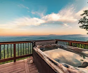 Photo 2 - Unparalleled Views, Deck w/ Hottub, Game Room Pool Table Panorama by Avantstay