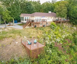 Photo 2 - Unparalleled Views Deck w Hottub Game Room Pool Table Panorama by Avantstay