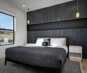 Photo 5 - Luxe Modern Escape w Pool Hot Tub Firepit Desert View Lassen by Avantstay