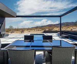 Photo 4 - Luxe Modern Escape w Pool Hot Tub Firepit Desert View Lassen by Avantstay