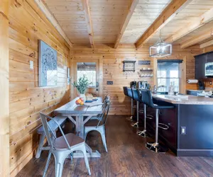Photo 4 - Cozy Cabin Hot Tub Balcony Golf Simulator Near Pigeon Forge Smoky Mountain Group Retreat Mountains Are Calling by Avantstay