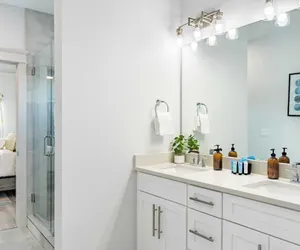 Photo 5 - Modern 5bdr w/ Private Pool, 2 min Walk to the Beach! Montoute by Avantstay