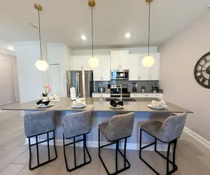 Photo 3 - Contemporary Townhouse w Pool BBQ Sleeps 12
