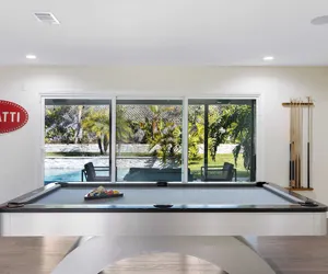 Photo 2 - Luxury Oasis w/ Pool + Hot Tub, Fire Pit, Pool Table Flight Ave by Avantstay