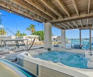 Photo 2 - Mermaid Manor Waterfront Haven w Hot Tub Dock