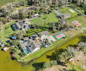 Photo 2 - Luxe Waterfront Hideaway w Pool & Pirate Ship Dock