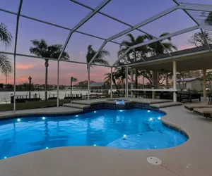 Photo 3 - Luxe Waterfront Hideaway w Pool & Pirate Ship Dock