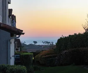 Photo 4 - Walk to Beach Pool, Hot Tub, Private Patio, Parking Seabreeze Retreat