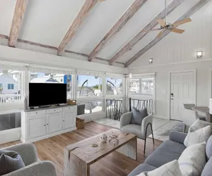 Photo 4 - Beach Retreat w/ Sundeck, Golf Cart & Bikes Bungalow House by Avantstay
