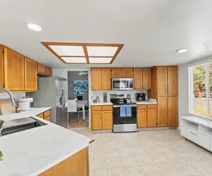 Photo 5 - Cozy 3BR Family Home With Patio BBQ Grill Close to Casinos and Shops