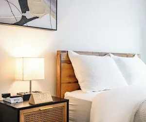 Photo 3 - Modern Cozy Retreat Stylish Stay With Patio & Parking