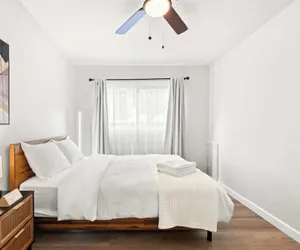 Photo 5 - Modern Cozy Retreat Stylish Stay With Patio & Parking