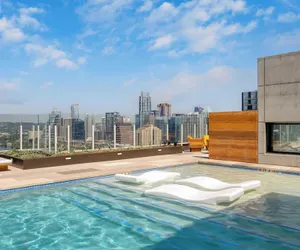 Photo 2 - Luxe High Rise Near DT Austin w/ Views Rooftop Pool, Gym, & Luxe Amenities
