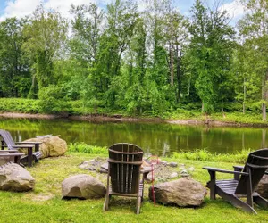 Photo 5 - Elizabeth House & Creekside Cabins by Avantstay Historic Event Estate With Cabins, Pool, and Swimming Hole Sleeps 20