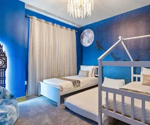 Photo 3 - Contemporary 4BR Townhome With Pool Themed Rooms