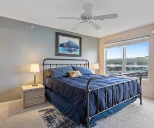 Photo 5 - Relaxing Lakefront Condo w/ 2 Heated Pools, Boat Ramp & Slip, Near Golf & Parks