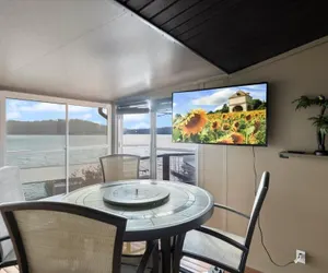 Photo 3 - Newly Updated Interior, Sunroom w/ Hot Tub, Deck, Deep Water Dock, Boat & PWC Slips