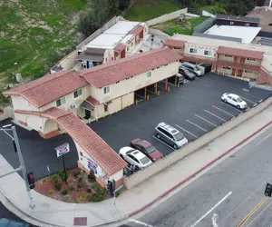Photo 2 - New American Inn and Suites