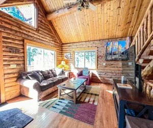 Photo 5 - Log cabin with fireplace, minutes from skiing, snowmobiling, xc ski, and more!