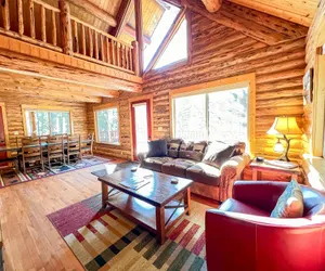 Photo 4 - Log cabin with fireplace, minutes from skiing, snowmobiling, xc ski, and more!