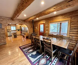 Photo 5 - Log cabin with fireplace, minutes from skiing, snowmobiling, xc ski, and more!