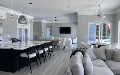 The Palms Retreat – Luxury Pool Home between Naples & Marco Island by SkyRun Naples