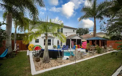 Gorgeous Urban Oasis W/hot Tub, Heated Pool And Private Movie Theater 3 Bedroom Home by RedAwning