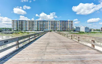 Beachfront Family Condo w/ Pool, Fishing, and Pier Access Amelia by the Sea