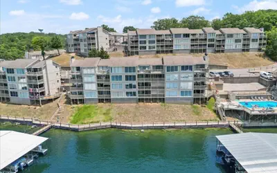 Bright Lakefront Condo With Cozy Patio, Big Views, Pools & Indian Pointe Fun