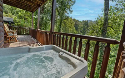 Photo 2 - Paw Prints Secluded Mountain View Cabin with Hot Tub and Pool Table