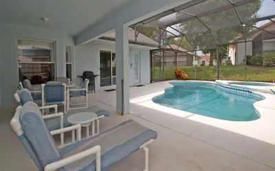 Photo 2 - 4BR Disney-Area Pool Home | BBQ Grill | Dog Friendly | Free WiFi