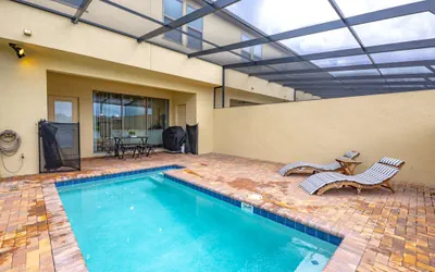 Photo 2 - 5 bedroom townhouse with a private pool!