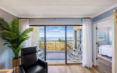 Photo 4 - Tastefully Decorated Condo with Scenic Beach Views