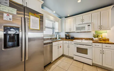 Photo 5 - Tastefully Decorated Condo with Scenic Beach Views