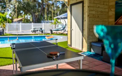 Photo 3 - Huge 8BR Stay | Heated Pool, Game Room, Near Beach
