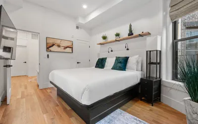 Photo 3 - Trendy 2BR Plus Family Getaway | Suite 4