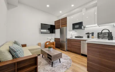 Photo 3 - Luxury 1BR: Sleek Kitchen + City Charm | Suite 2