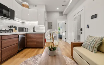 Photo 4 - Luxury 1BR: Sleek Kitchen + City Charm | Suite 2